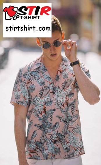 Handsome Male In Hawaiian Shirt Standing On Street With Sunglasses  Tucked In 